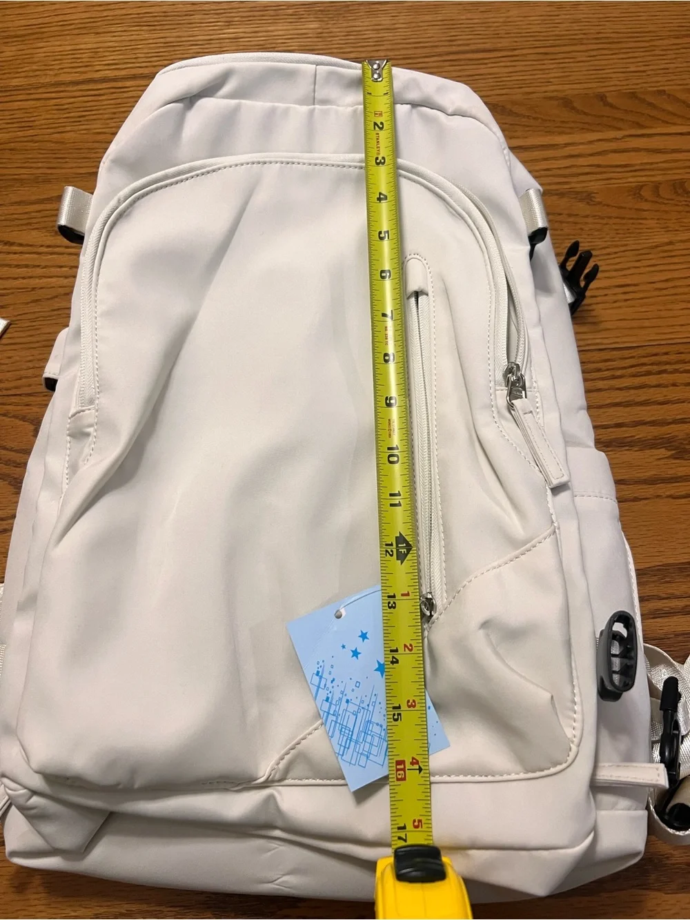 Off White Everyday Backpack with Front Zip Pocket!  Lots of pockets!